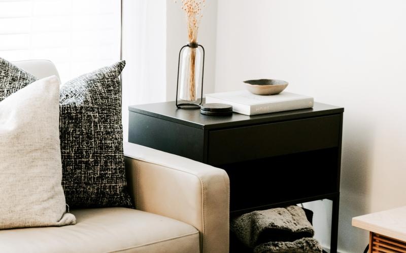 a living room with a couch and a table